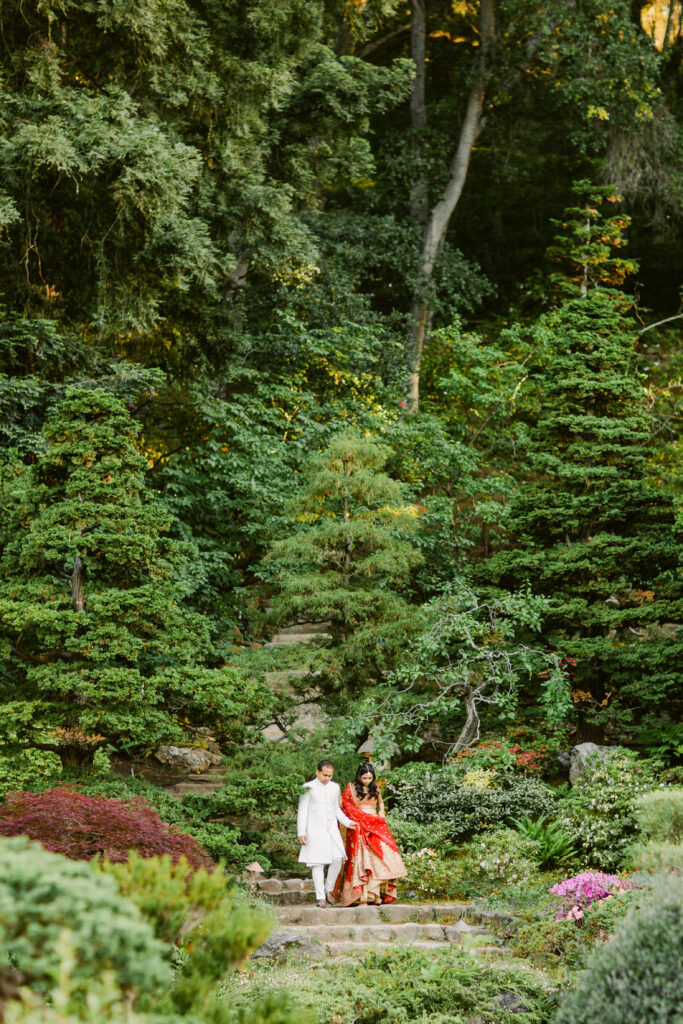 bride and groom descending stairs at Hakone Gardens