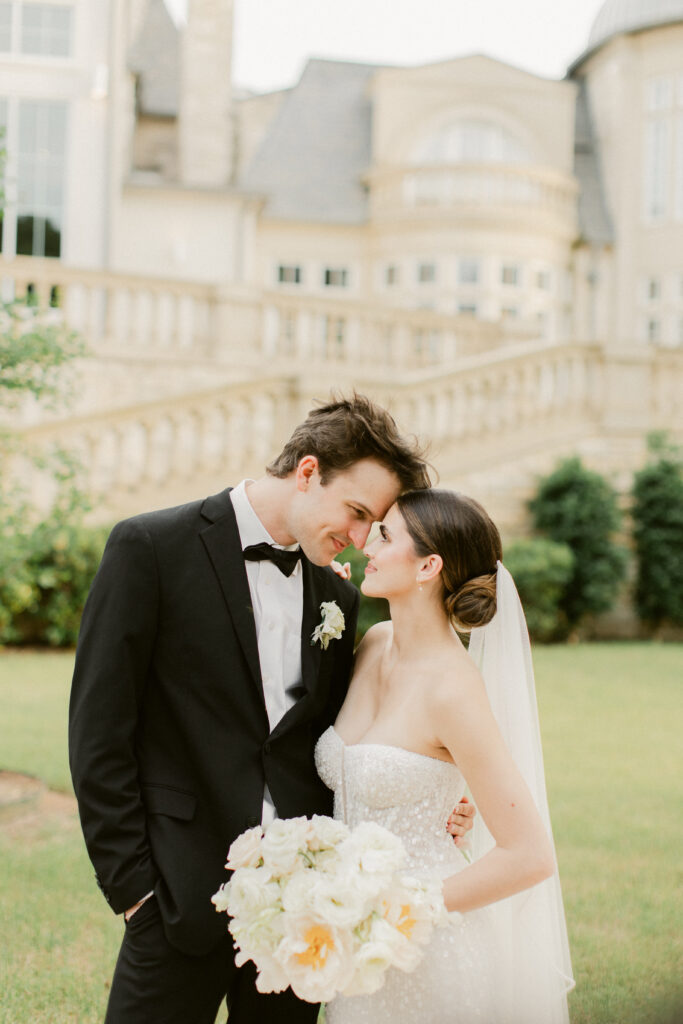 Golden hour portrait of couple forehead to forehead