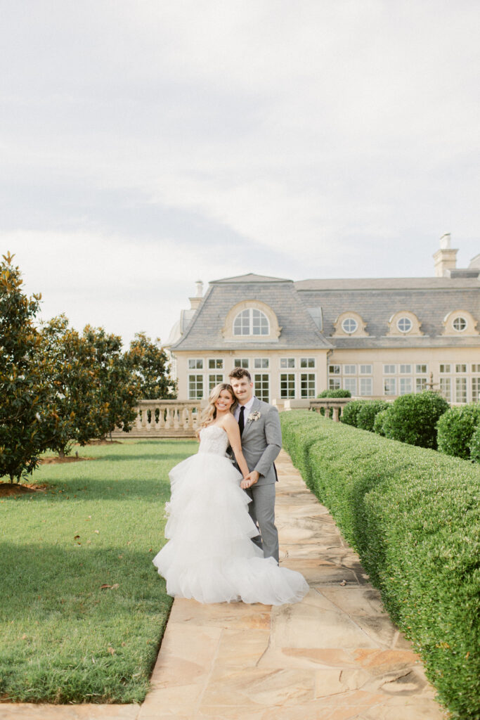 Intimate moment between bride and groom outdoors at The Olana