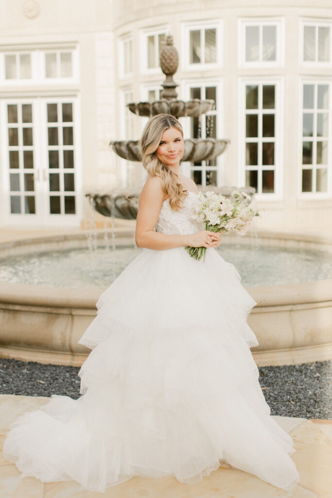 Bridal portrait outside in front of the fountain