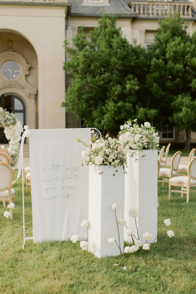 Elegant outdoor wedding signage at The Olana entrance