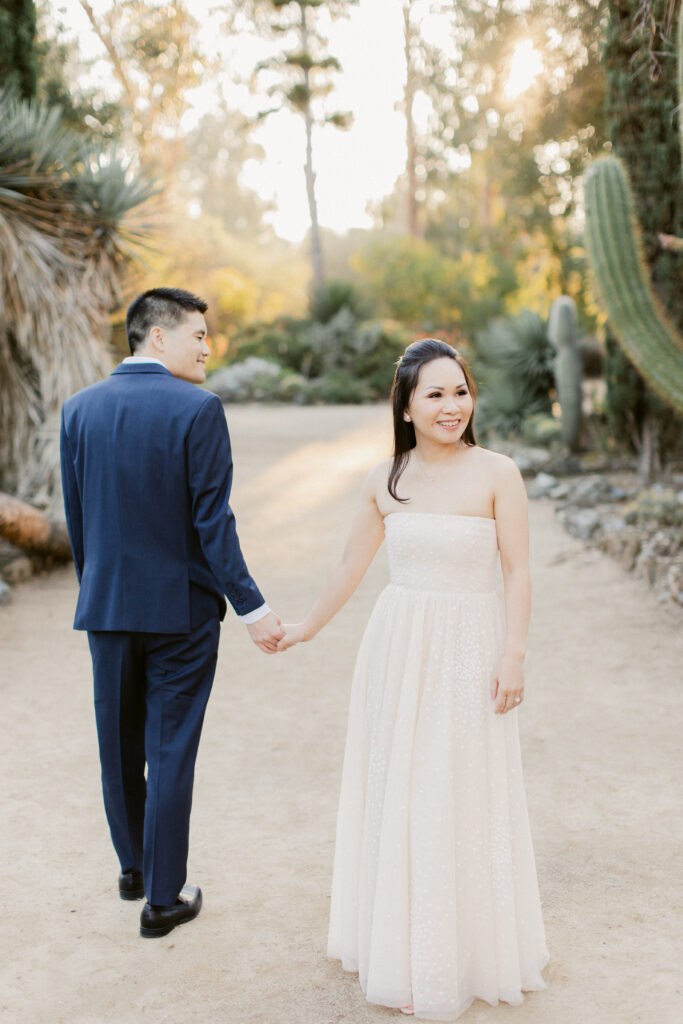 Engagement portraits among desert plants at the Stanford Cactus Garden in Palo Alto