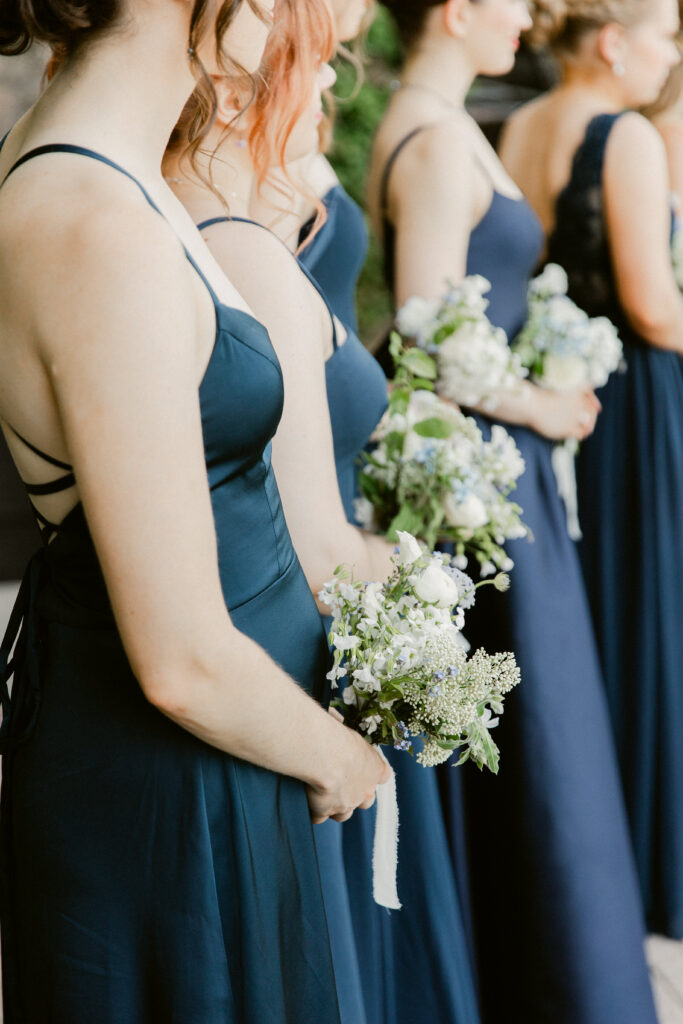Bridesmaid details during ceremony at CIA Greystone wedding in St. Helena