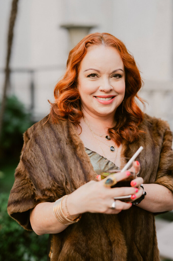 Guest gathering outside Flood Mansion for cocktail hour