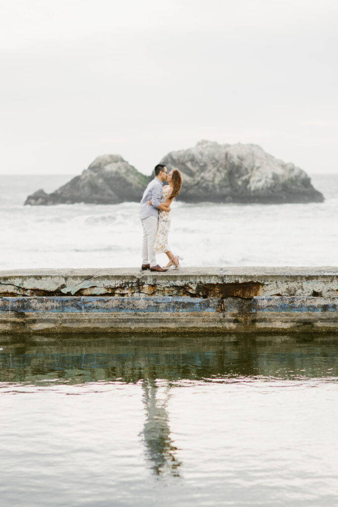 Intimate coastal portrait with ocean backdrop