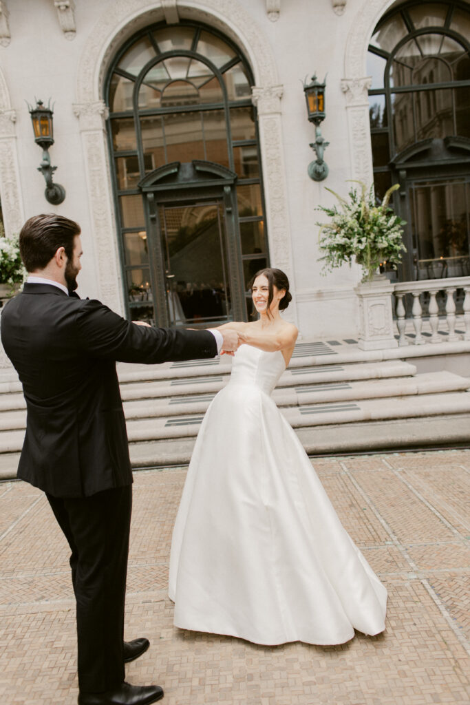 Bride and groom dancing at wedding