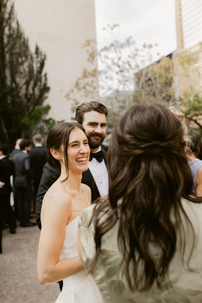 Candid photo of bride laughing