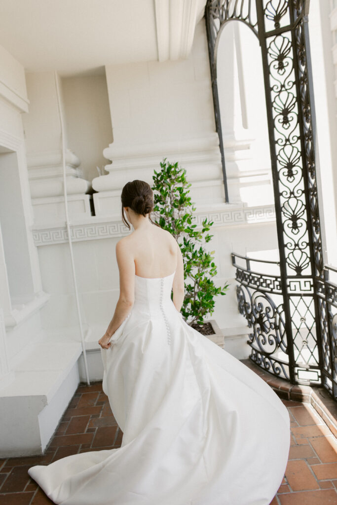 Bride twirling on the balcony of the Fairmont San Francisco