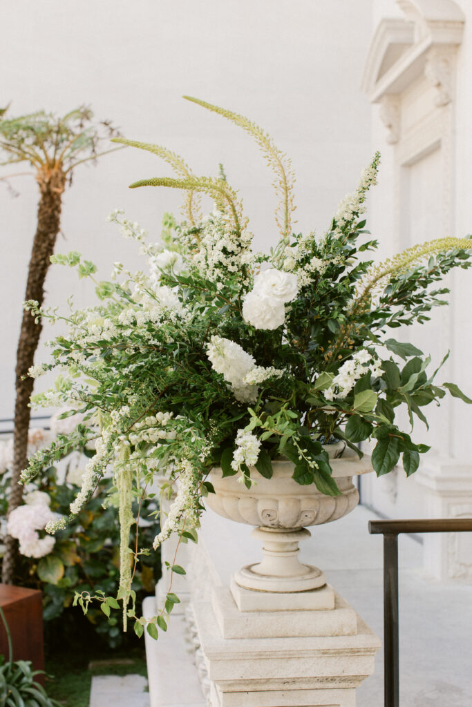 White and green ceremony florals at Flood Mansion